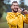handsome-hipster-using-vintage-camera copy