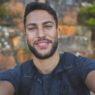 man-selfie-portrait-hiking-mountain-with-backpack-adventure-morning-workout-fitness-person-pov-trail-walk-with-photo-memories-social-media-post-profile-picture-update (1) Man, selfie and portrait for hiking on mountain with backpack, adventure or morning workout for fitness. Person, POV or trail walk with photo for memories, social media post or profile picture update.